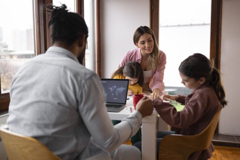 medium-shot-family-sitting-table